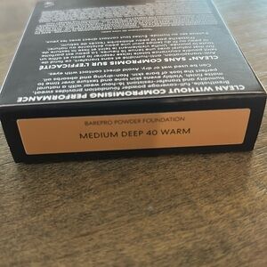 - bareMinerals BAREPRO Powder Foundation in shade:Medium Deep 40 WARM